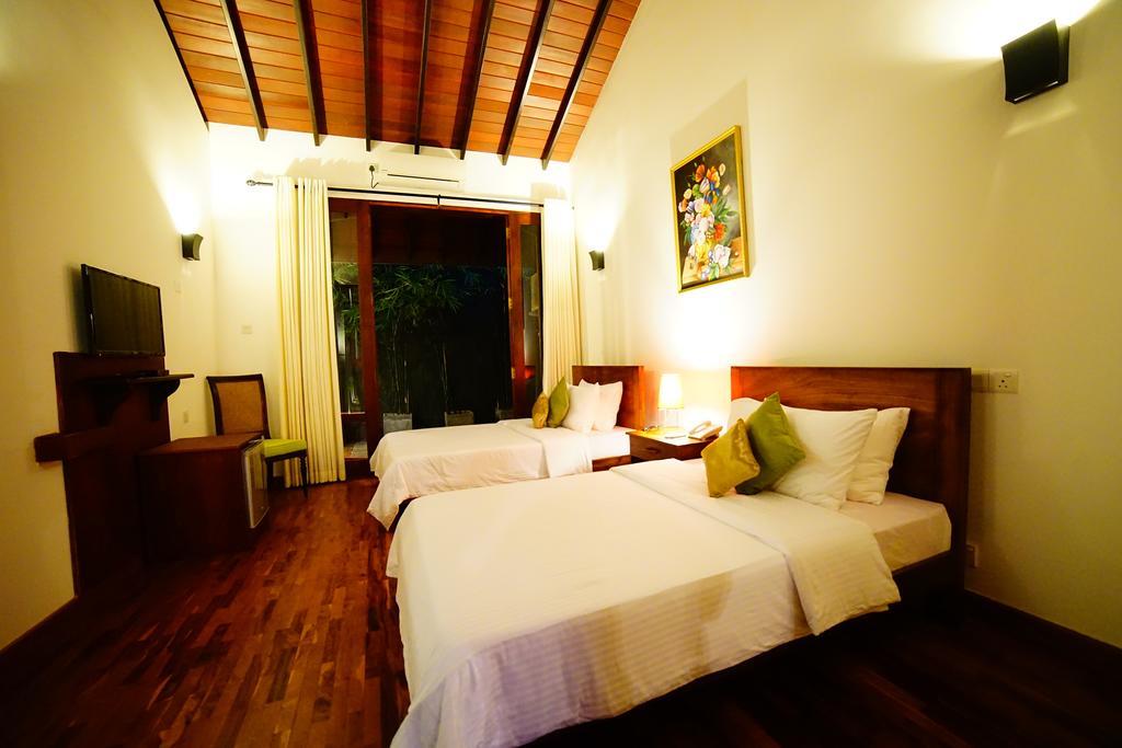 Lespri Grand Negombo Quarto foto